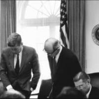 black and white photo of 2 males in a office during the Cuban Missile Crisis