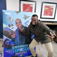 KPMG Globerunner Cup Team Member Posing by Top Gun Poster