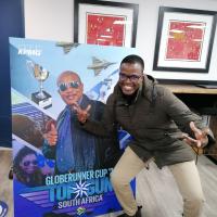 KPMG Globerunner Cup Team Member Posing by Top Gun Poster