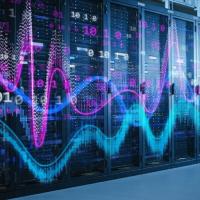 Photo of several server racks in a data center, with IBM logo superimposed