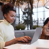 Black woman at laptop