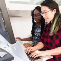 Two women at computers