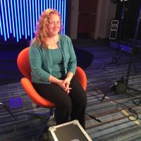 Erika Wharton from Unum sits in chair for interview