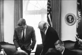 black and white photo of 2 males in a office during the Cuban Missile Crisis