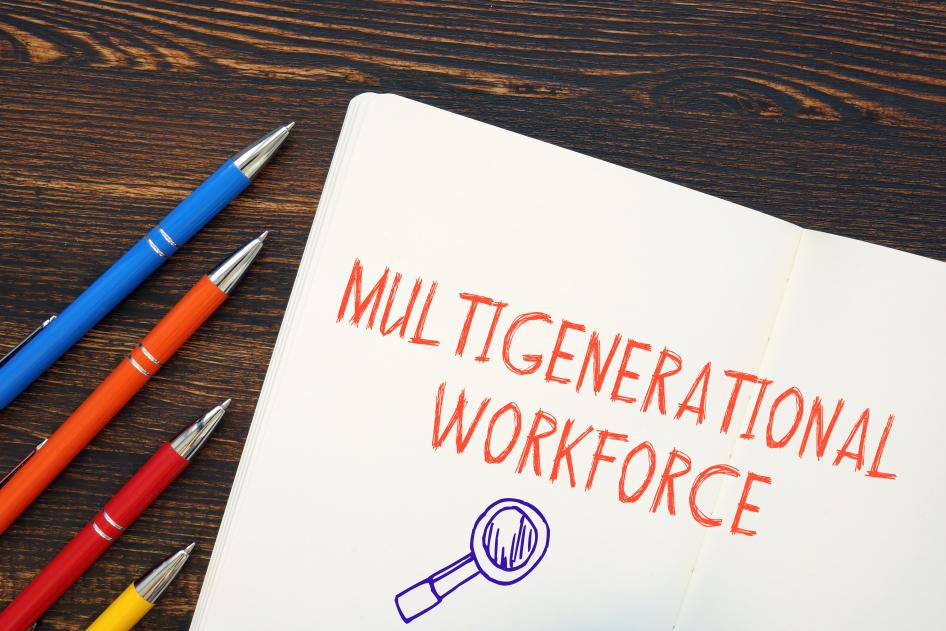 Pens on table with Multigenerational Workforce sign