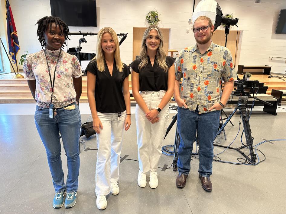 Four Interns on video shoot at Salvation Army