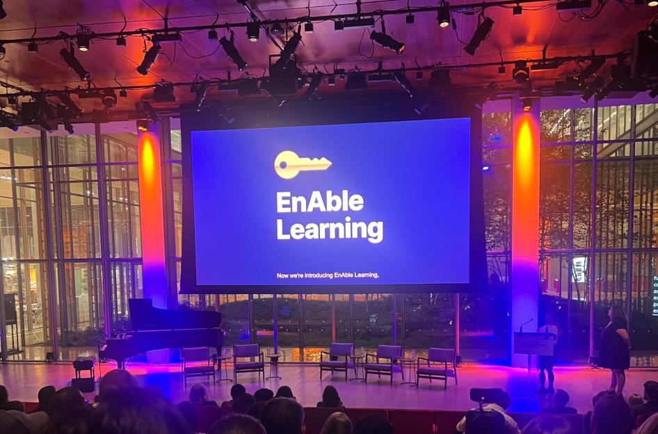 NOD Technology and the Disability Experience shot of screen on stage that reads Enable Learning