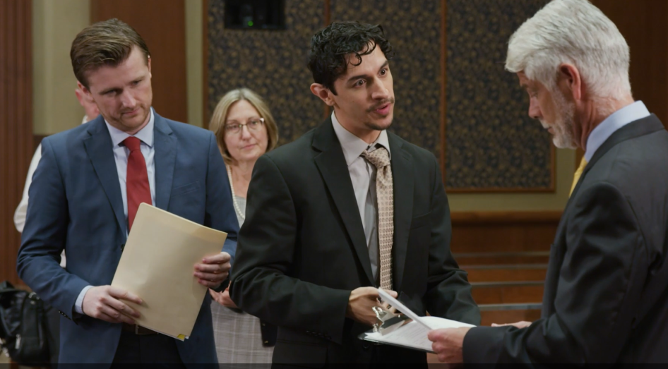 Three men in a courtroom