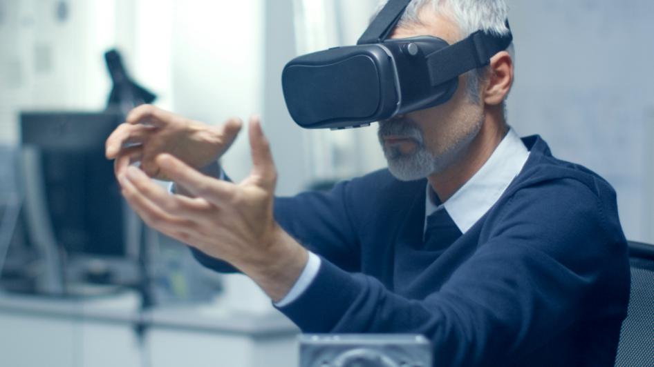 Photo of a man wearing a virtual reality headset