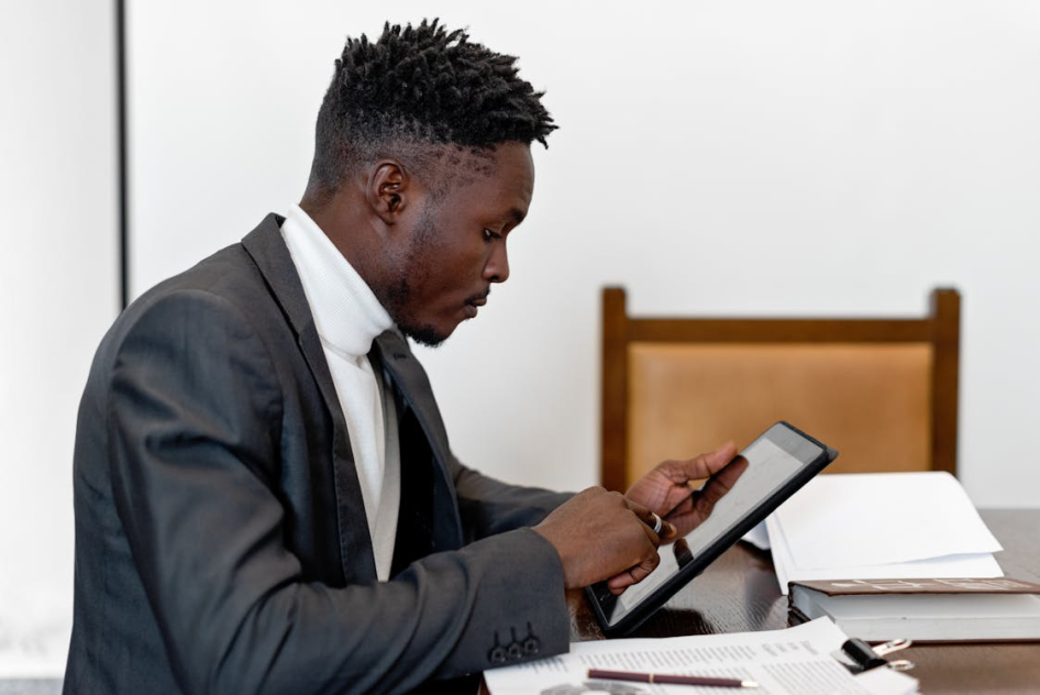 Man in office on tablet