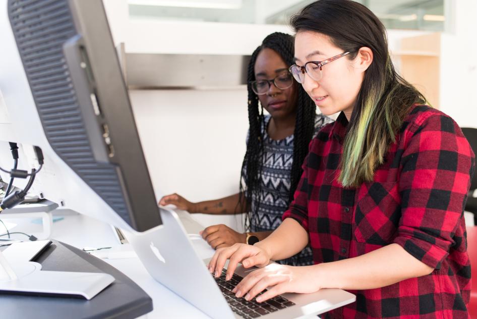 Two women at computers