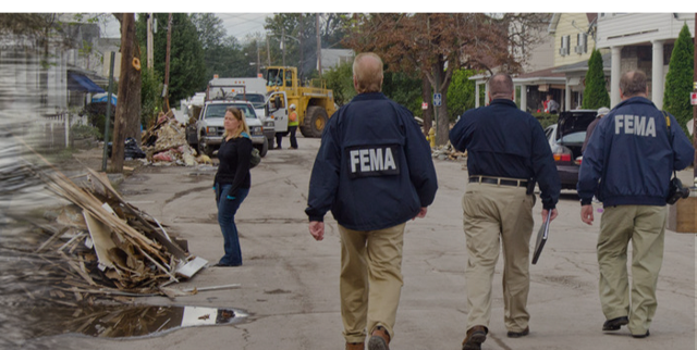 FEMA Workers at disaster site.