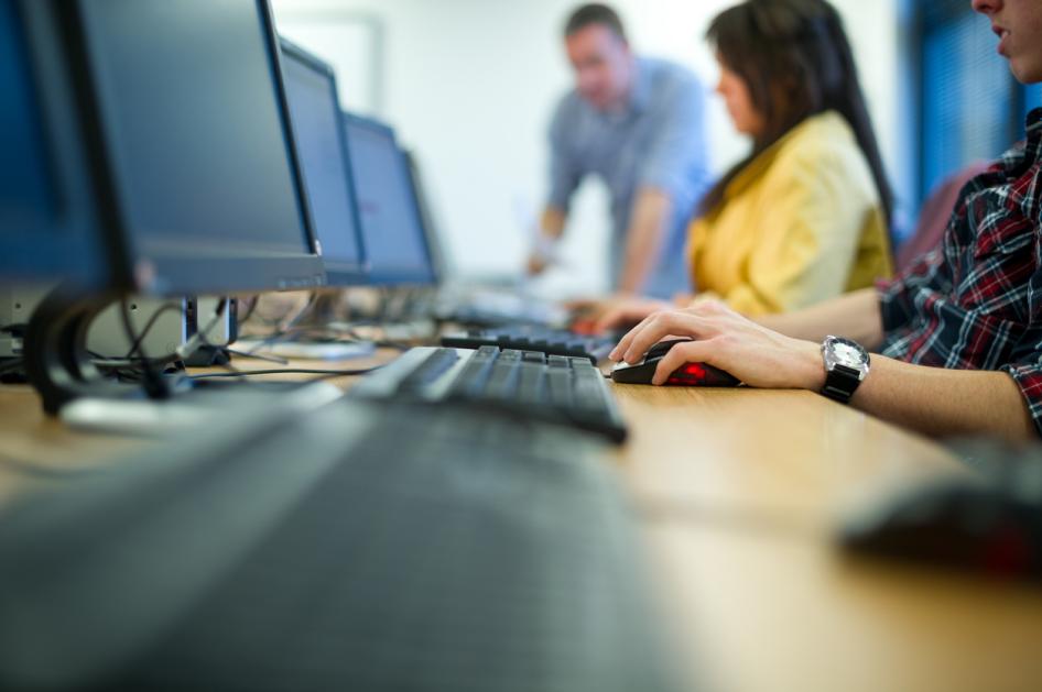 Row of students working on computers
